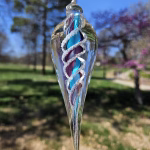 Handmade memorial dewdrop made with cremation ash in purple and aqua.