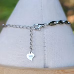 Sterling silver clasp and extender chain on filigree triple stone cremation ash bracelet, showing S925 heart tag
