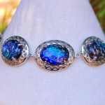 Filigree triple stone bracelet with cremation ash in sparkling blue glass set in sterling silver