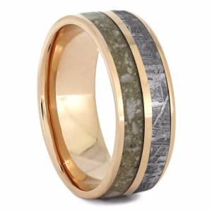 Angled view of solid gold memorial ring with meteorite inlay and cremated ashes