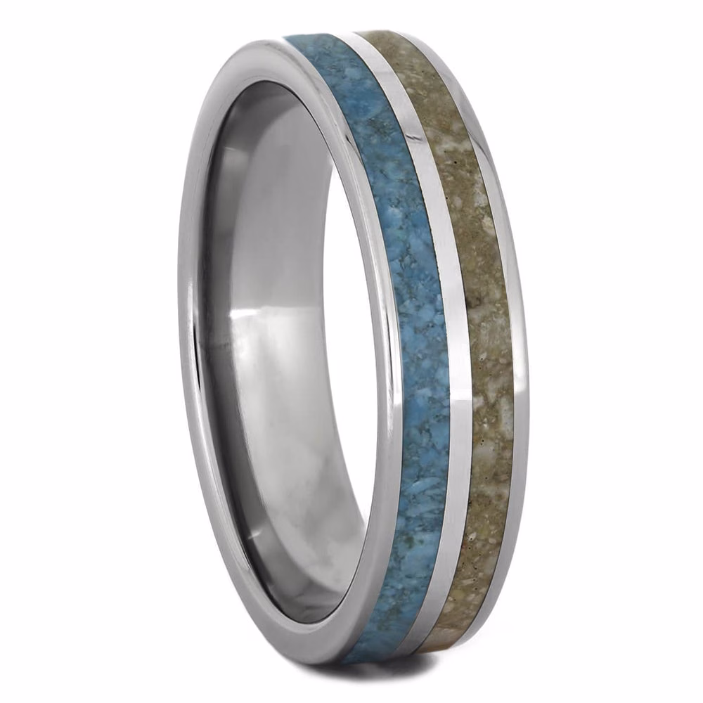 Angled view of memorial ring with turquoise inlay and cremation ash set in sterling silver