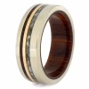 Angled view of solid gold cremation ring with cocobolo wood sleeve and cremation ash inlay