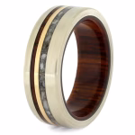 Angled view of solid gold cremation ring with cocobolo wood sleeve and cremation ash inlay