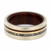 Solid gold cremation ring with cocobolo wood sleeve and cremation ash inlay