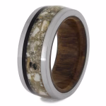 Cremation ring with oak and ebony wood interior showing brushed metal edge and memorial ash inlay band