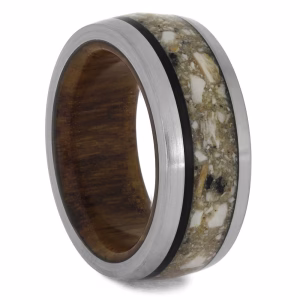 Cremation ring with oak and ebony wood shown at an angled view highlighting the memorial ash inlay and brushed metal edges