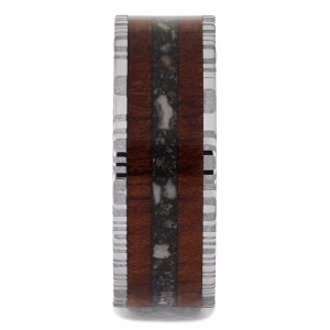 Cremation ring with ashes featuring bloodwood inlay and damascus steel sleeve memorial band, straight-on view
