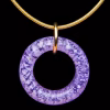 Amethyst halo cremation pendant with encased cremation ash on gold necklace displayed on black background