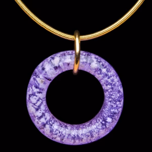 Amethyst halo cremation pendant with encased cremation ash on gold necklace displayed on black background