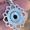 Back view of Mandala Flower cremation pendant in sterling silver