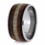Memorial ring with cremation ashes featuring natural wood inlay and dark accent bands, angled side view