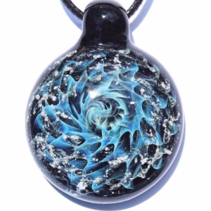 Handmade dark blue galaxy cremation pendant made with cremation ash.