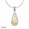Teardrop cremation pendant in Glacier glass with cremation ash encased inside, shown on a silver-tone chain.