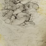 Close-up of Glenwood White cremation urn showing subtle marble-like veining and natural stone texture