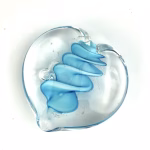 Clear glass eternity heart featuring a soft blue flowing center design, handcrafted with cremation ash.