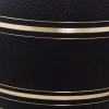 Close-up detail of black onyx cremation urn with gold accent bands
