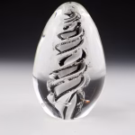 Handmade black and white eternity egg memorial made with cremation ash.