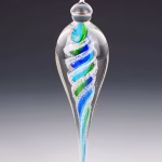 Handmade memorial dewdrop made with cremation ash in Aqua, Green and Blue