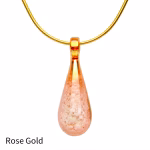 Teardrop cremation pendant in Rose Gold glass with cremation ash encased inside, shown on a gold-tone chain.