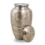 Silver and gold radiant platinum cremation urn with engraved pattern and matching lid