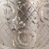 Close-up detail of silver and gold radiant platinum cremation urn pattern