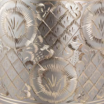 Close-up detail of silver and gold radiant platinum cremation urn pattern