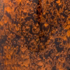 Close-up of tall bamboo cremation urn in amber showing textured lacquer finish