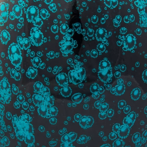 Close-up of blue tall bamboo cremation urn showing textured speckled finish on glossy surface