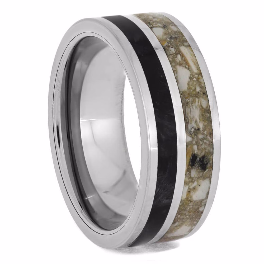 Cremation ring with ashes and black box elder burl wood inlay set in polished titanium memorial band, angled view