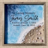 Square Oceanside Memorial made with cremation ash, featuring a serene shoreline scene with ocean waves, sandy beach details, seashells, and engraved personalized memorial text honoring a loved one.