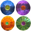 Four circular memorial glass suncatchers with cremation ash displayed as color examples, including blue with yellow center, purple with amber center, amber with green center, and green with purple center, each featuring a rippled translucent glass texture.