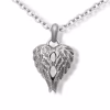 Close-up image of a silver heart-shaped cremation pendant formed by detailed angel wings, shown on a silver chain against a white background.