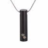 Black cylinder cremation necklace featuring engraved paw prints on the front, designed to discreetly hold a small amount of pet ashes