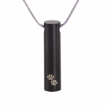 Black cylinder cremation necklace featuring engraved paw prints on the front, designed to discreetly hold a small amount of pet ashes
