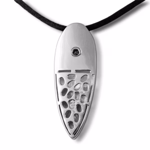 Backside of a polished silver Diamond River cremation pendant featuring a small central gemstone near the top and an openwork pebble-pattern design covering the lower portion, hanging from a black cord.