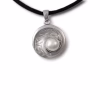 Silver cremation pendant with a raised pearl nested in a textured circular design