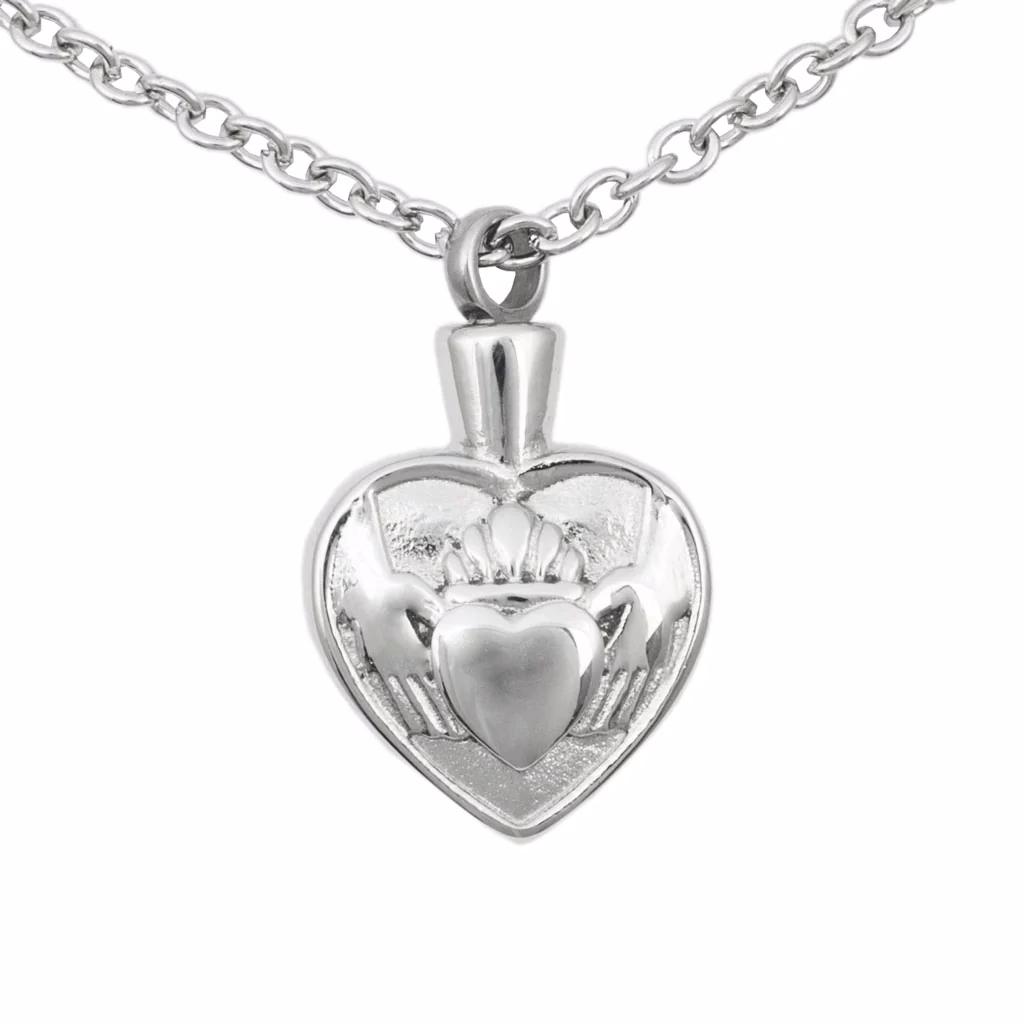 Silver Claddagh cremation necklace with heart, hands, and crown design on stainless steel pendant