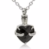 Obsidian Heart Cremation Necklace shown from the front, featuring a faceted black heart-shaped stone held by silver claw-style prongs and attached to a silver chain.