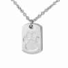Close-up image of a stainless steel dog tag–style cremation pendant featuring an engraved paw print design on the front.