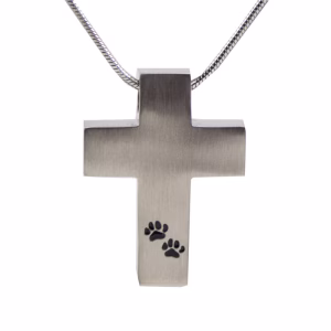 Pewter cross cremation necklace featuring two engraved paw prints on the front, designed to hold a small amount of pet ashes as a memorial keepsake
