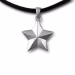 Sterling silver star-shaped cremation pendant with a faceted five-point design hanging on a black cord, crafted to hold a small amount of ashes