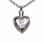 Close-up view of a silver heart-shaped cremation pendant engraved with a teddy bear design on the front, shown hanging from a silver chain.
