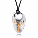 Silver teardrop-shaped cremation pendant with a polished finish, featuring a raised gold Tree of Life design on the front and suspended from a black cord.