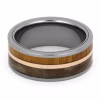 Inside view of tungsten memorial ring with rowan wood inlay, rose gold center channel, and preserved pet fur shown on white background