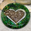 Green loving paws glass suncatcher with heart and paw print design and encased cremation ash
