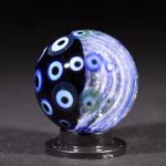 Handmade Shadow Marble with Cremation Ash in blue and black dot stack glass design