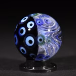 Handmade Shadow Marble with Cremation Ash in blue and black dot stack glass design