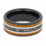 Top view of black ceramic memorial ring with orange enamel pinstripes and titanium inlay band containing cremation ashes.