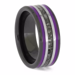 Angled view of black ceramic memorial ring with purple enamel pinstripes and titanium inlay band containing cremation ashes.