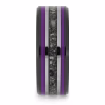 Straight-on view of black ceramic memorial ring with purple enamel pinstripes and titanium inlay band containing cremation ashes.